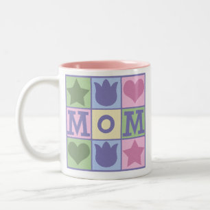 L'édredon de maman d'amusement ajuste la tasse à