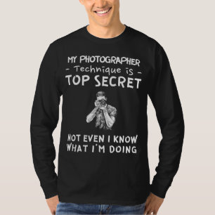 Leg de mysterie van mijn topgeheime fotograaf vast t-shirt