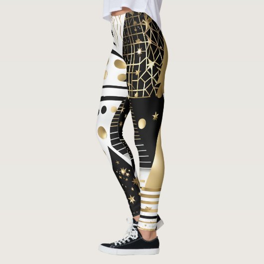 leggings abstraits en or et triangles noirs (Gauche)