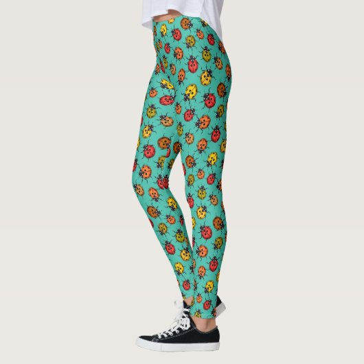 Leggings Bugs colorés sur turquoise (Gauche)