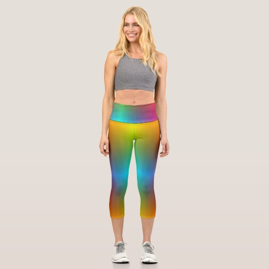 Leggings Capri A person wearing vibrant, rainbow-gradient legging (Recto)