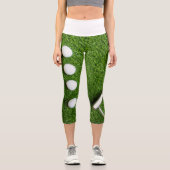Leggings Capri Ball de golf avec putteur sur herbe verte (Recto)