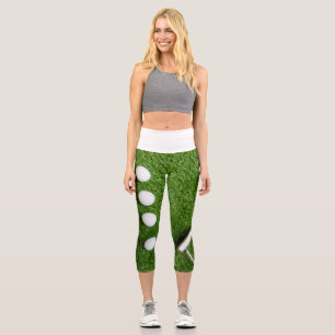 Leggings Capri Ball de golf avec putteur sur herbe verte