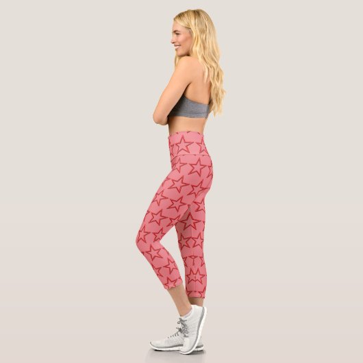 Leggings Capri Capri - Étoiles rouges sur rose (Gauche)