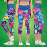 Leggings Capri Carton Mandala bleu rose jaune et orange<br><div class="desc">Ce mandala funky est habillé de bleu,  rose,  jaune et orange dans un style de dessin animé. Des visuels géométriques trippy pour l'hippie moderne ou amoureux de couleurs vibrantes!</div>