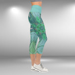 Leggings Capri Carton Mandala Flower bleu et vert<br><div class="desc">Cette fleur de mandala funky design présente le bleu et le vert dans un style de dessin animé. Des visuels géométriques trippy pour l'hippie moderne ou amoureux de couleurs vibrantes!</div>