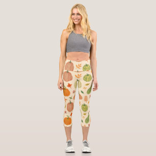 Leggings Capri Citrouille vert et orange, motif sans soudure.