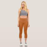 Leggings Capri Couleur uni orange brillant<br><div class="desc">Arrière - plan de couleur uni orange vif. C'est une couleur orange brûlée belle,  élégante et chic. Fonctionne pour de nombreuses occasions. coques officiels / informels. hex#b95814</div>