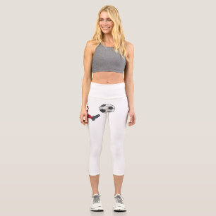 Leggings Capri Joueur de football rétro frappant le ballon en vol