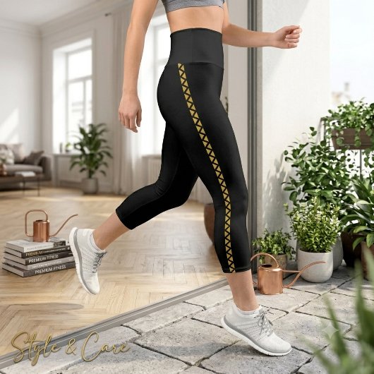 Leggings Capri Legging capri noir avec rayure latérale dorée auda
