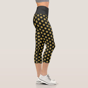 Leggings Capri Marguerite africaine jaune sur motif floral noir