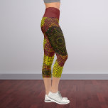 Leggings Capri Tisser Mandala jaune et orange<br><div class="desc">Ce mandala funky est décoré de jaune et d'orange dans un style de tissage de panier. Des visuels psychédéliques pour l'hippie moderne ou toute personne qui aime les couleurs super.</div>