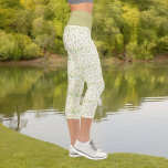 Leggings Capri Vert Jaune Nature Fern Feuille Motif sur blanc<br><div class="desc">Ce design de style nature présente un arrière - plan motif de feuilles de fougère sur blanc avec un bracelet couleur complémentaire.</div>