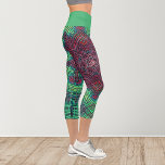 Leggings Capri Weer Mandala Vert Bleu et Rouge<br><div class="desc">Ce mandala funky présente des tons vert,  bleu et rouge dans un style de tissage en panier. Des visuels psychédéliques pour l'hippie moderne ou toute personne qui aime les couleurs super.</div>