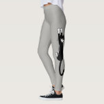 Leggings Chat noir et blanc accroché | Drôle Tuxedo Cat<br><div class="desc">Chat noir et blanc avec pattes grises. Amusez-vous pour la salle de gym,  le cours de yoga,  ou à la maison sur le canapé serré avec votre chaton. Jenn's Doodle World vous propose des légendes encore plus insolites et des produits amusants avec ce chat fou en smoking. ©Jenn Inashvili</div>