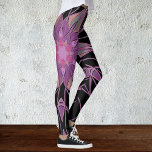 Leggings Dessin Mandala Flower noir violet et rose<br><div class="desc">Cette fleur de mandala funky est composée de noir,  violet et rose dans un style de dessin animé. Des visuels géométriques trippy pour l'hippie moderne ou amoureux de couleurs vibrantes!</div>