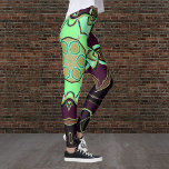 Leggings Dessin Mandala Flower vert violet et noir<br><div class="desc">Cette fleur de mandala funky est décorée de vert,  violet et noir dans un style de dessin animé. Des visuels géométriques trippy pour l'hippie moderne ou amoureux de couleurs vibrantes!</div>
