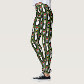 Leggings Drôle Pingouins de Noël effrayés sur vert (Gauche)