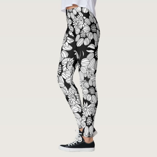 Leggings Fleurs blanches sur un arrière - plan noir (Gauche)