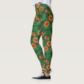 Leggings Fleurs Zinnia orange, feuilles verts sur vert fonc (Gauche)