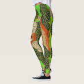 LEGGINGS FOX ROUGE PARMI LES FEUILLES VERTS ET LE FOLIAGE (Gauche)