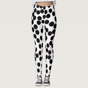 Leggings grand pois aléatoire noir sur les guêtres blanch
