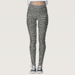 Leggings Gris à motifs léopard sur charbon<br><div class="desc">Préparez-vous à vous sentir à l'aise dans ces leggings extensibles et imprimés, avec un motif empreinte de léopard classique en gris pâle sur un arrière - plan au charbon de bois. Parfait pour le temps d'automne, portez-les avec votre paire de bottes préférées et un chandail bouillonnant pour un look tendance...</div>