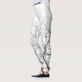 Leggings Légendes blanches avec branches d'arbres. (Gauche)