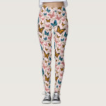 Leggings Motif à papillons<br><div class="desc">Des légendes motifs de papillons,  filles et blanches,  illustrant des papillons roses,  jaunes et bleus sur un arrière - plan rose. Il y a aussi des feuilles verts.</div>