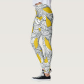 Leggings Motif de feuilles gris et jaune. (Gauche)