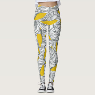 Leggings Motif de feuilles gris et jaune.
