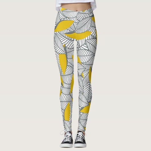 Leggings Motif de feuilles gris et jaune. (Devant)
