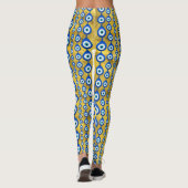 Leggings motif de l'oeil malin sur la texture dorée (Dos)