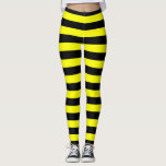 Leggings Motif noir et jaune de rayures<br><div class="desc">Les caractéristiques de conception ce des rayures noires et jaunes modèlent.</div>