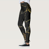 Leggings Noir avec pattes d'huile d'or (Gauche)