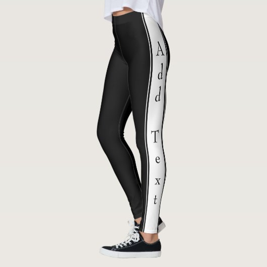 Leggings noirs à rayure latérale avec texte et cou (Gauche)