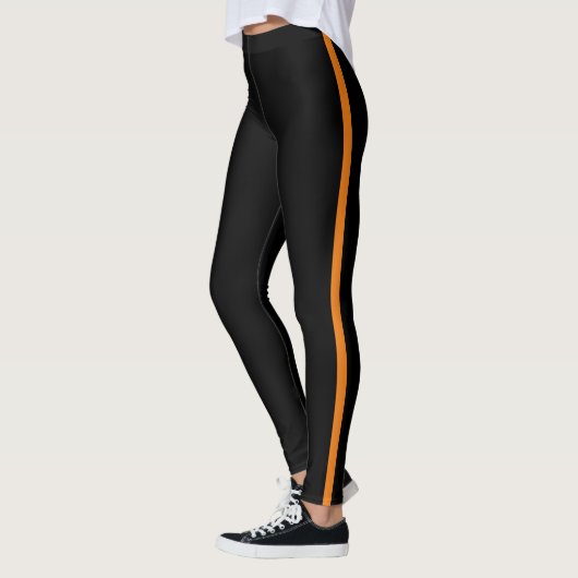 Leggings noirs élégants avec bande latérale orange (Gauche)