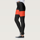 leggings orange et noir (Gauche)