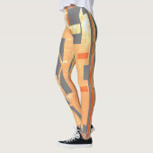 Leggings Orange Jaune Blanc Charbon Foncé MCM Look (Gauche)