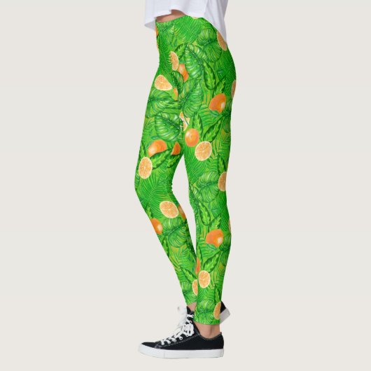 Leggings Oranges et feuilles tropicaux (Gauche)