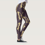 Leggings papillon élégant à parties scintillant d'or<br><div class="desc">Design moderne et élégant représentant des papillons parties scintillant faux or sur un arrière - plan violet.</div>