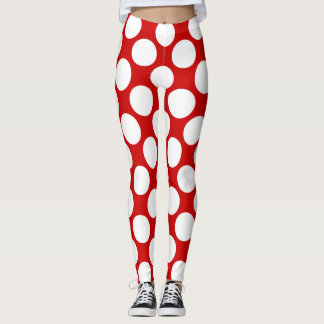 Leggings pois blancs grands sur un arrière - plan rouge Jeu