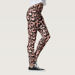 Leggings Poster de animal Rose Gold Leopard Spots<br><div class="desc">Ces leggings présentent un motif branché de taches de léopard noir sur un arrière - plan rose en or.</div>