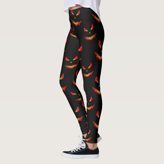 Leggings Sparkly Jack O'Lantern face motif Halloween (Gauche)