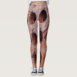 Leggings van geroosterd geperforeerd metaal