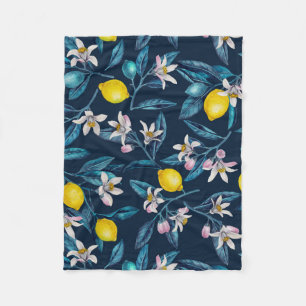 Lemon branches with blossoms and fruit on blue fleece deken