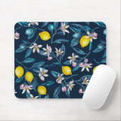 Lemon branches with blossoms and fruit on blue muismat (Met muis)