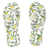 Lemon branches with blossoms and fruit on white teenslippers (Voetbed)