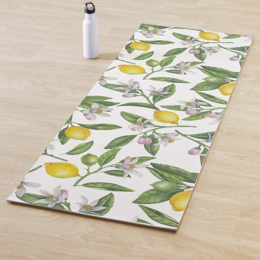 Lemon branches with blossoms and fruit on white yogamat (In situ)