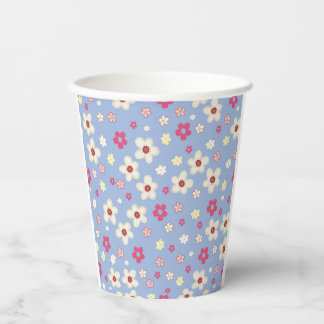 lente bloemen op blauwe achtergrond papieren bekers
